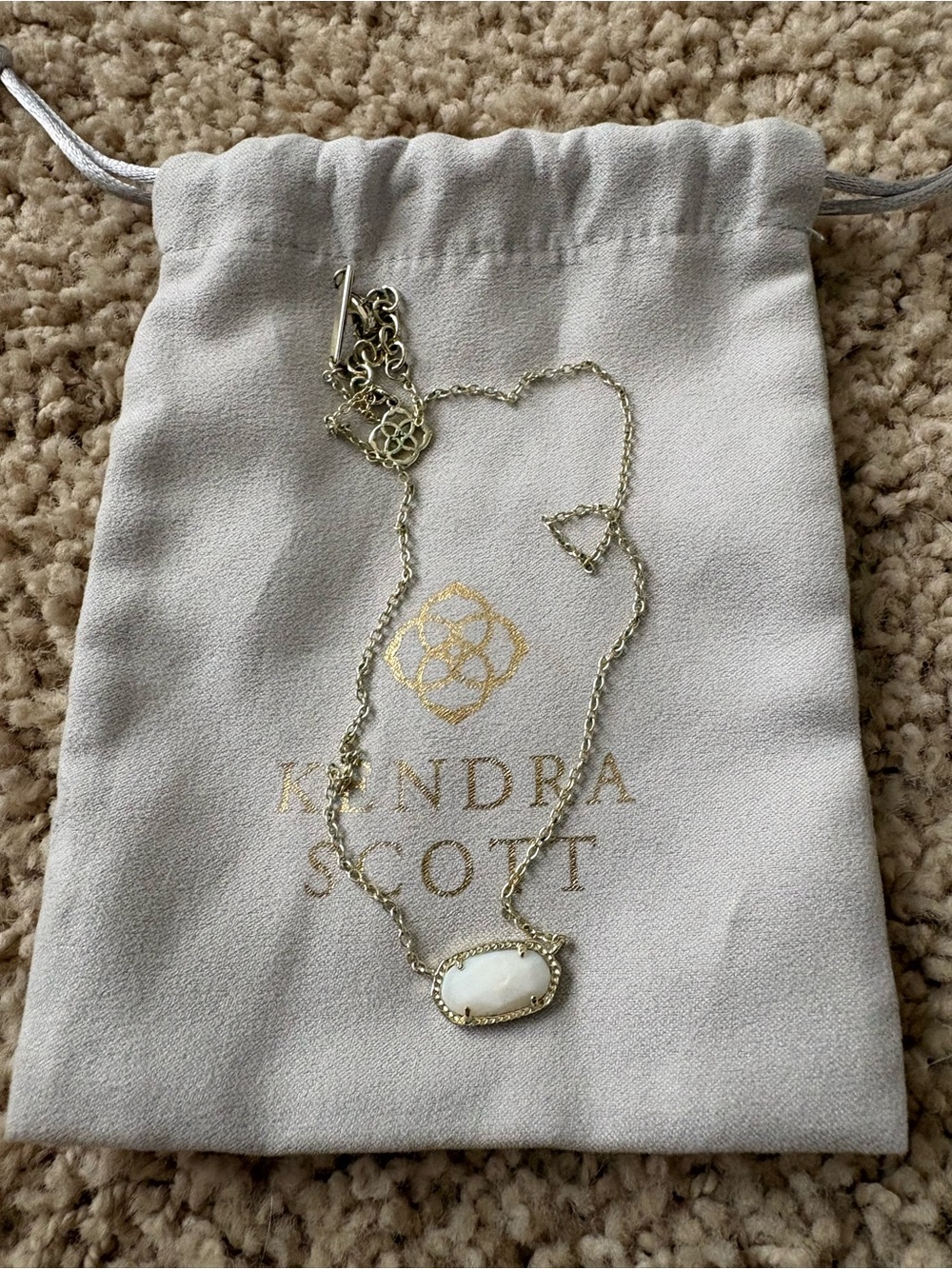 Kendra Scott Gold Necklace with White Oval Pendant